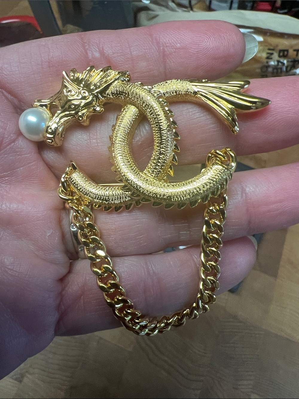 Authentic Channel Gold tones Dragon Brooches with Pearl Accent.